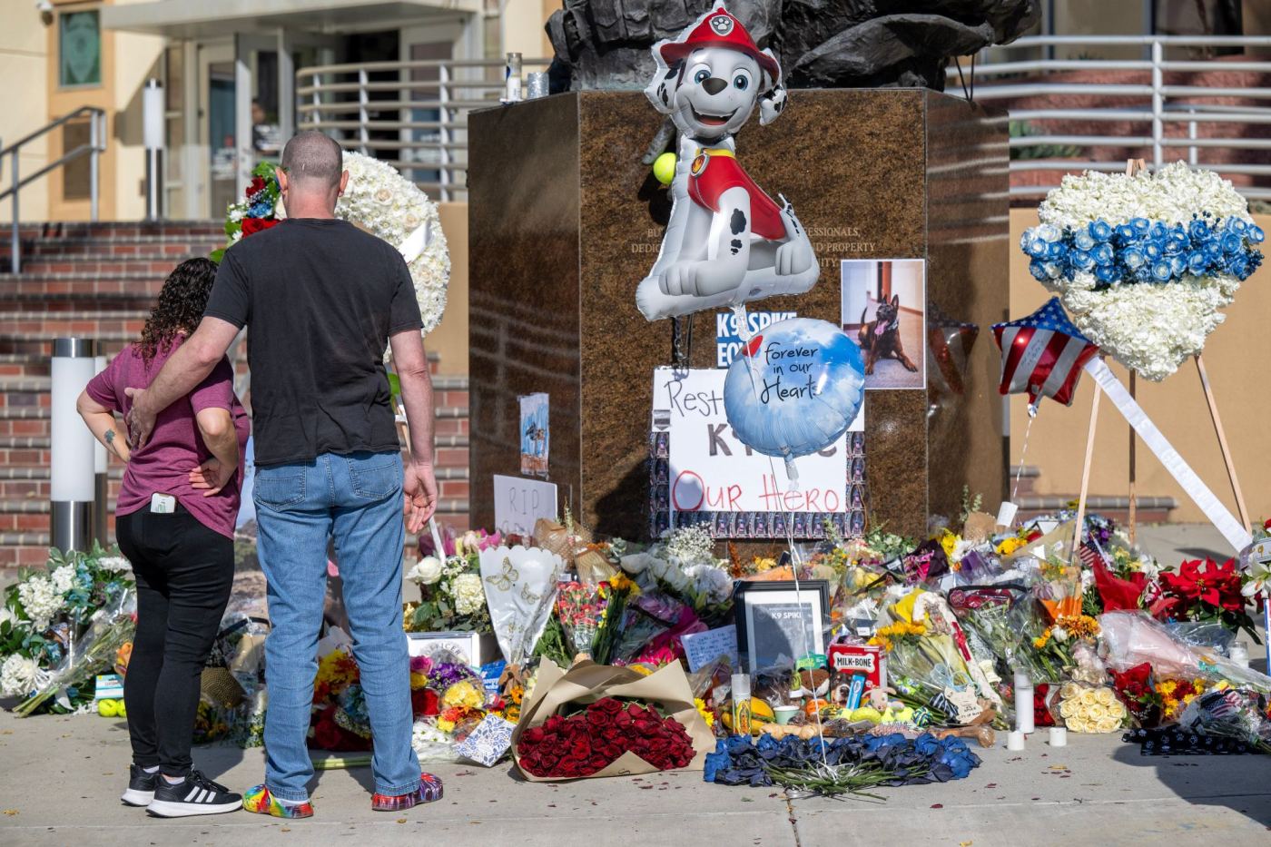 Law enforcement officers and community members honor Burbank police K9 named Spike