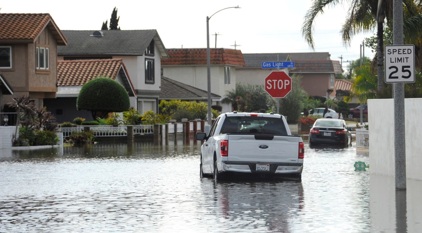 Flash floods, multiple rescues and 1 killed by a falling tree as storm rattles OC, LA