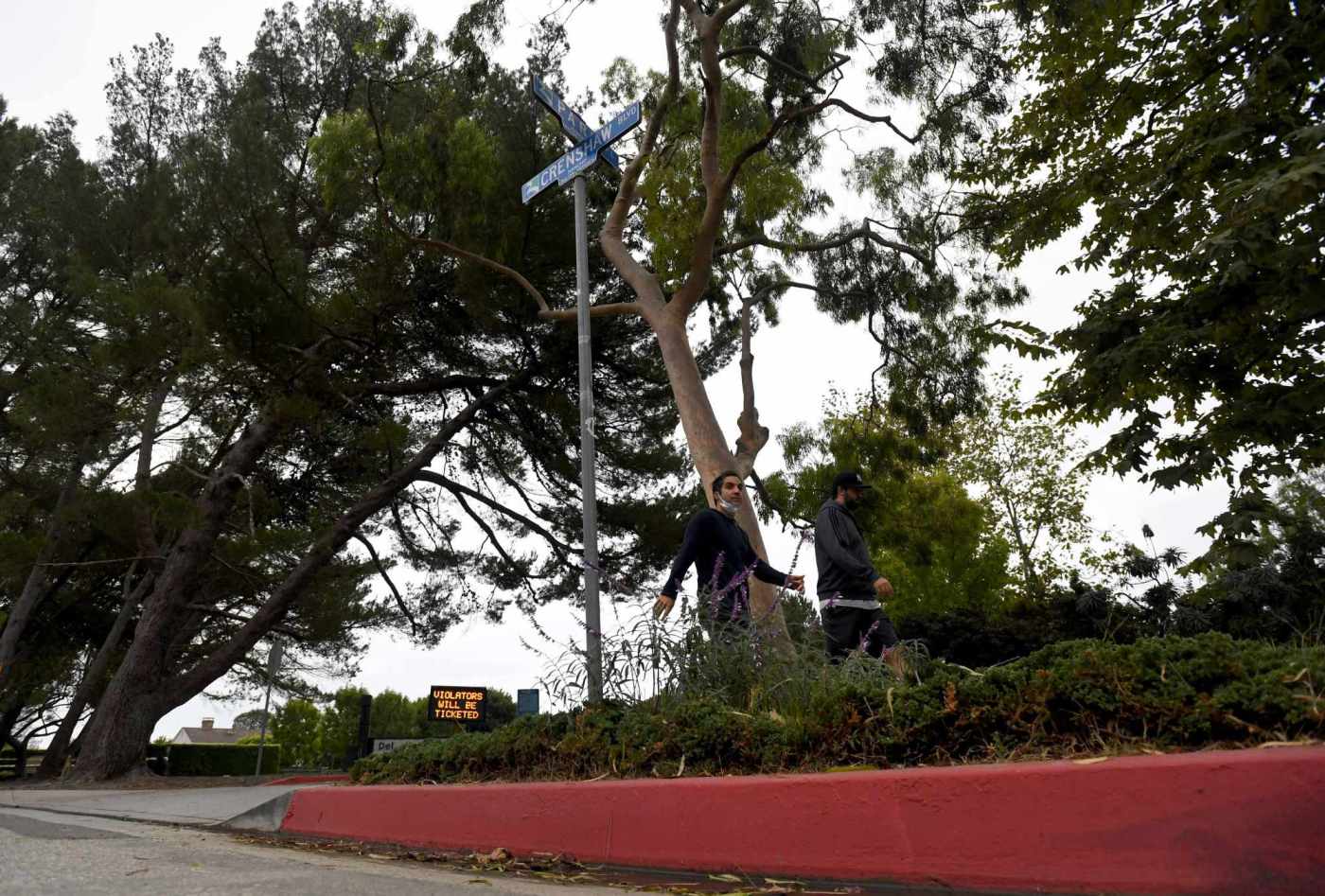 Under the new law, how close can you park to a street corner?